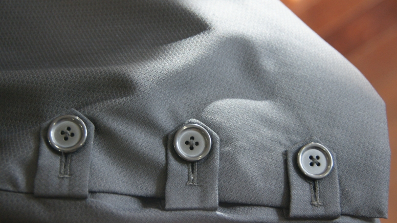 Loops and buttons on jacket sleeves.